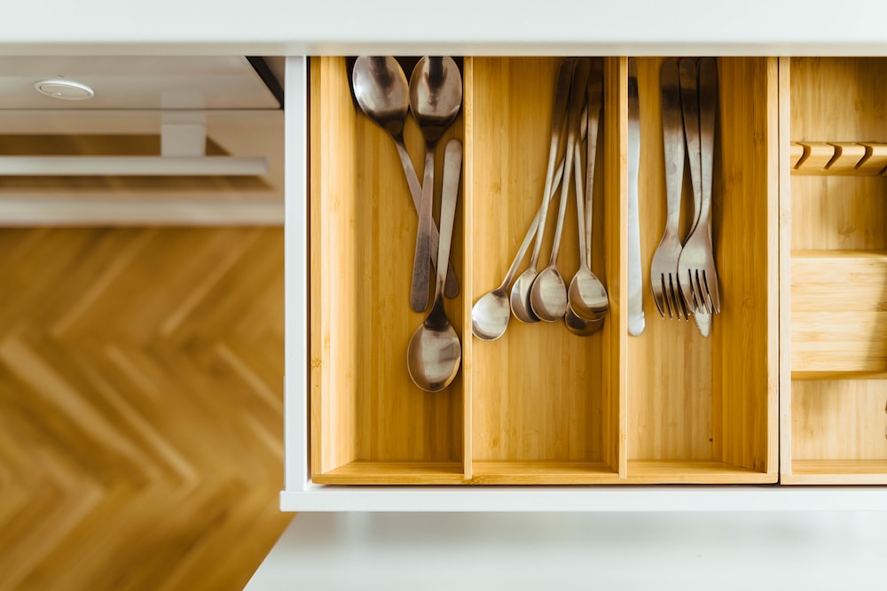 How can I organize my small desk without drawers?