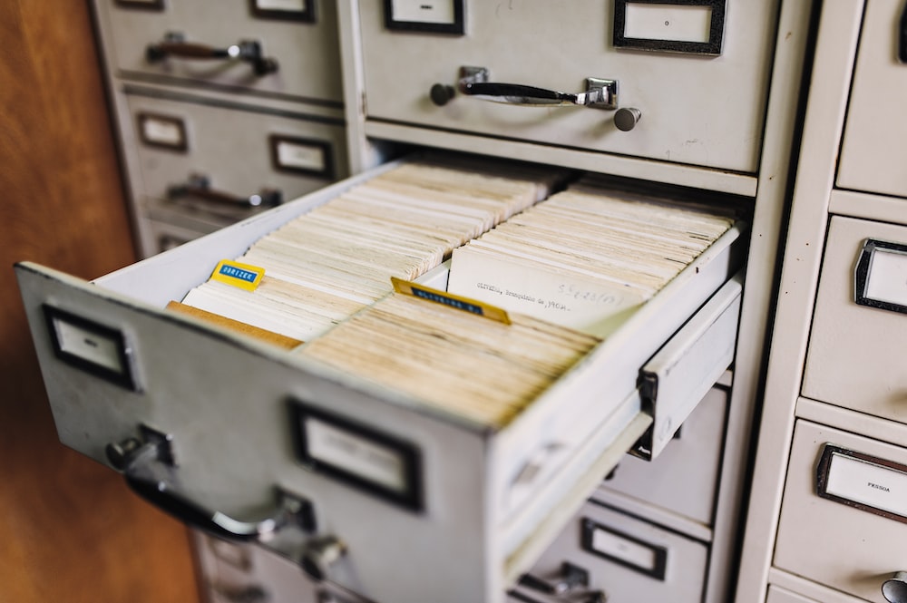 How do you organize a filing system?
