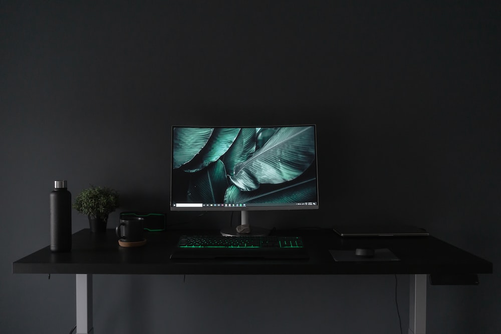 How do you set up a minimalist desk?